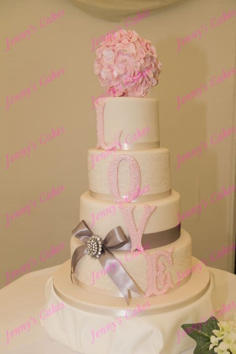 Designer Wedding Cake with LOVE Letters and Ruffle Ball Cake Topper