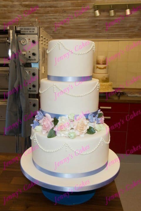 Floral Wedding Cake with Sugar-Crafted Rose border and Piped Pearls