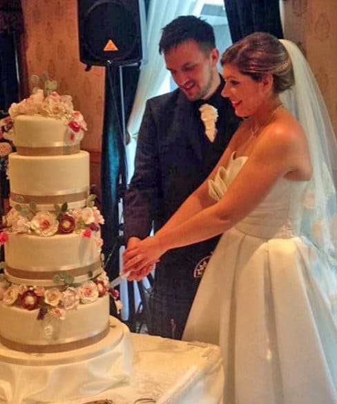 Cutting the Wedding Cake Photo Summer Garlands Rustic Wedding Cake