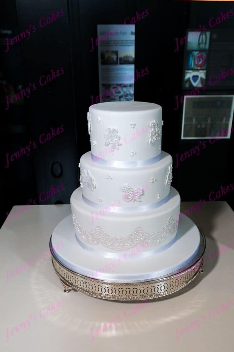 3 Tier wedding cake with sugar lace pieces