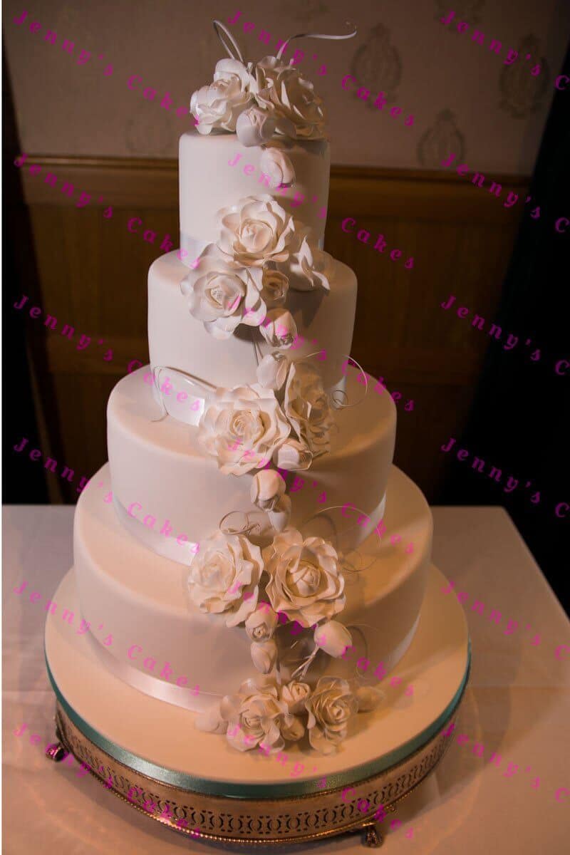 Designer Wedding Cake with White rose Cascade