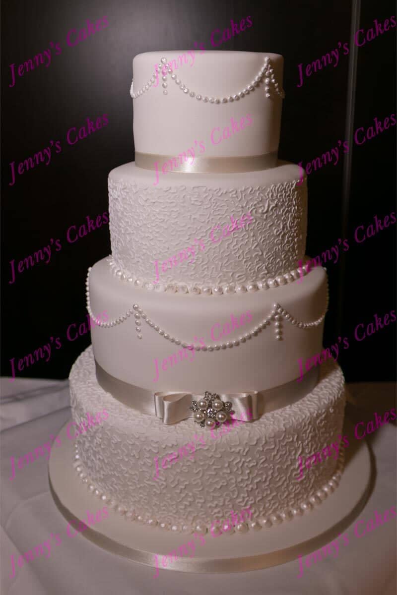 Elegant Textured Wedding Cake with Dior Bow